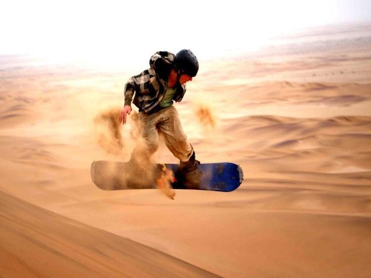 Extreme sports sand boarding